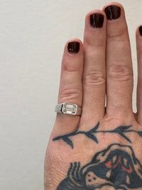 Emerald East-to-West Bezel Diamond Engagement Ring