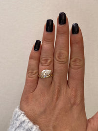 Tilted Pear-Shape Diamond Engagement Ring