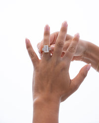 Emerald with Trapezoid Side Stones Diamond Engagement Ring