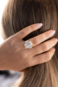 Emerald with Trapezoid Side Stones Diamond Engagement Ring