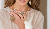 Discover the Timeless Charm of Vintage Alhambra Pendants: A Must-Have Jewelry Collectible
