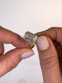 Emerald Bezel Engagement Ring