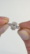1.30 Carat Oval With Pear Shape Side Stones Diamond Engagement Ring In 14k White Gold