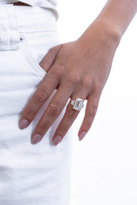 Emerald with Trapezoid Side Stones Diamond Engagement Ring