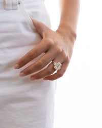 Emerald with Trapezoid Side Stones Diamond Engagement Ring