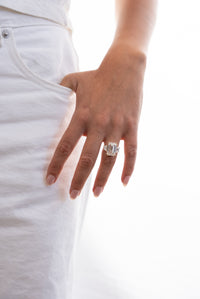 Emerald with Trapezoid Side Stones Diamond Engagement Ring